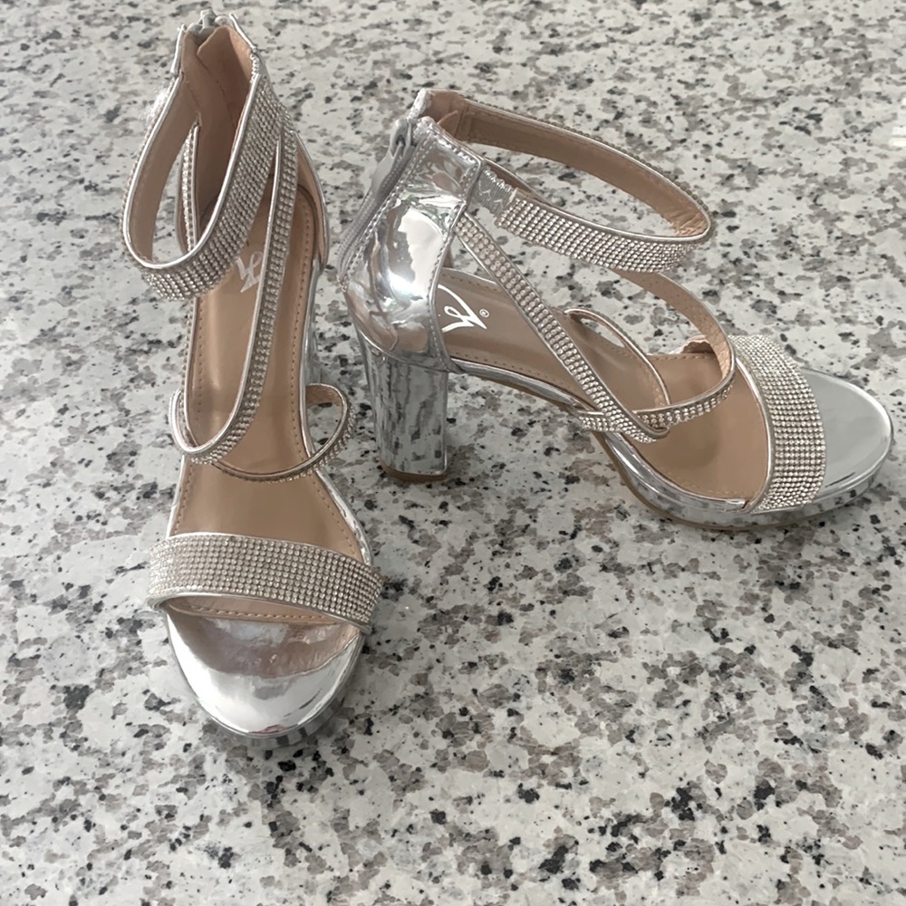 Women a dress heels with diamond straps